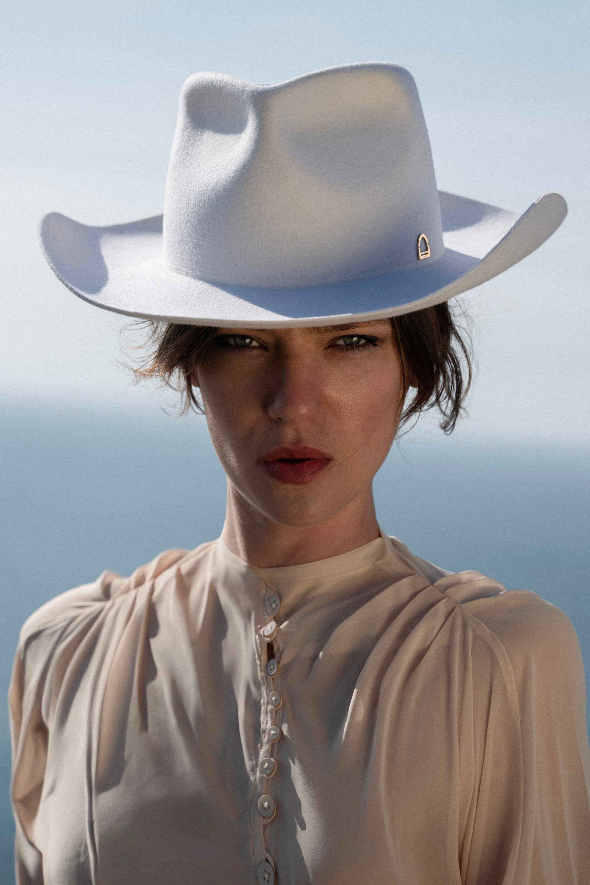 White Cowboy Hat - Gold Stirrup Accent