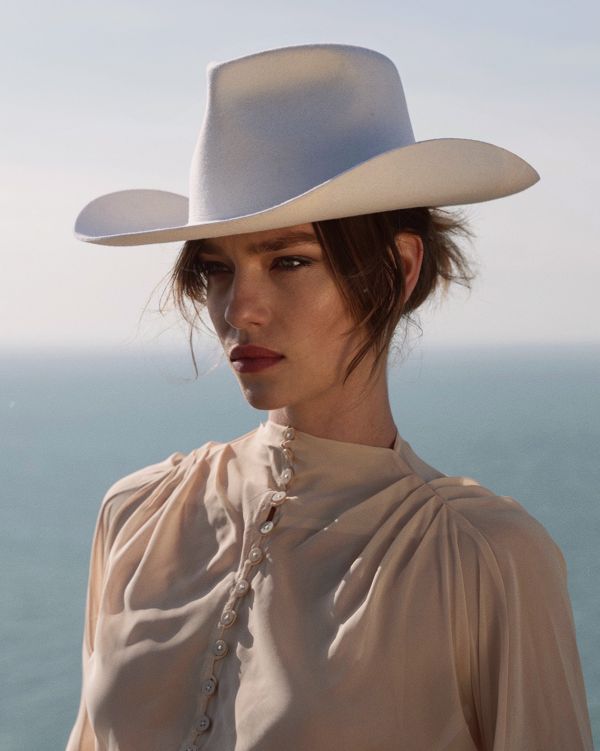 White Cowboy Hat - Gold Stirrup Accent